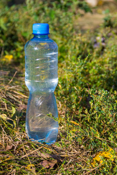 istock Plastic bottle of drinking water on the ground 857249450