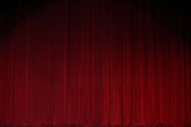 istock Red Curtain close before theatre drama begin 857252504