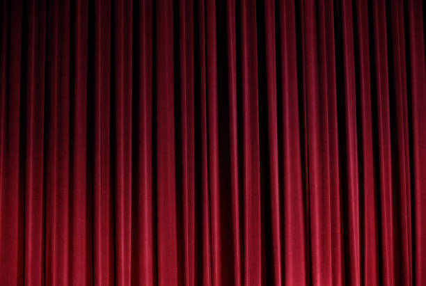 istock Red Curtain close before theatre drama begin 857252534