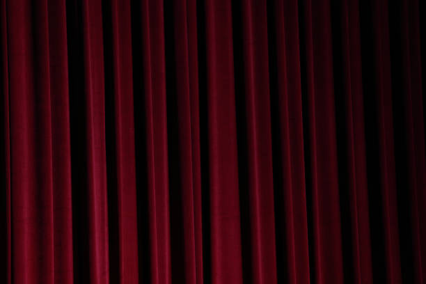 istock Red Curtain close before theatre drama begin 857252704