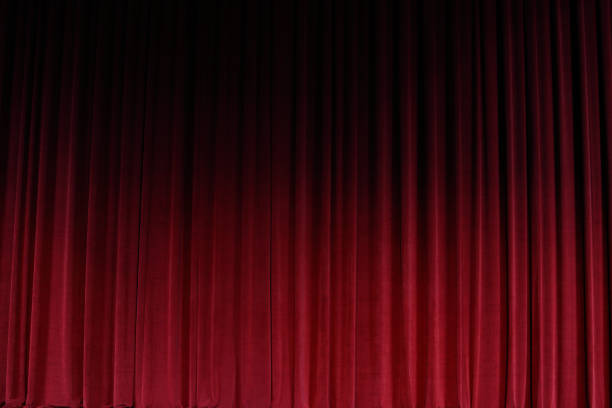 istock Red Curtain close before theatre drama begin 857252738