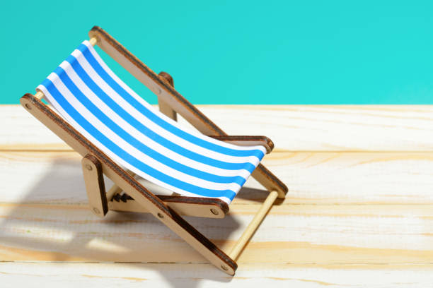 istock Striped beach chair in light 857270760