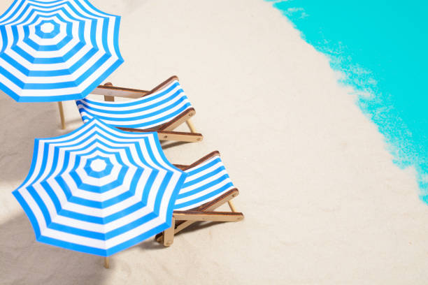 istock Beach furniture under umbrellas 857270876