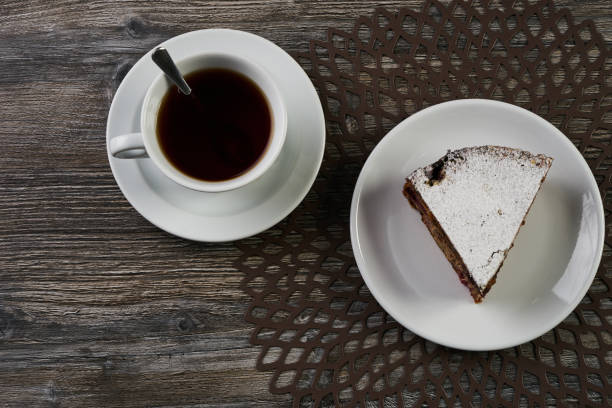 istock Slice of homemade cranberry cake with walnuts 857271504