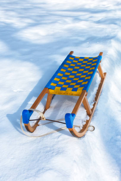 istock Wooden sledge in winter snow 857272078