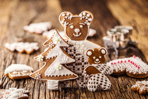 Christmas. Gingerbread family with christmas tree and christmas pastry