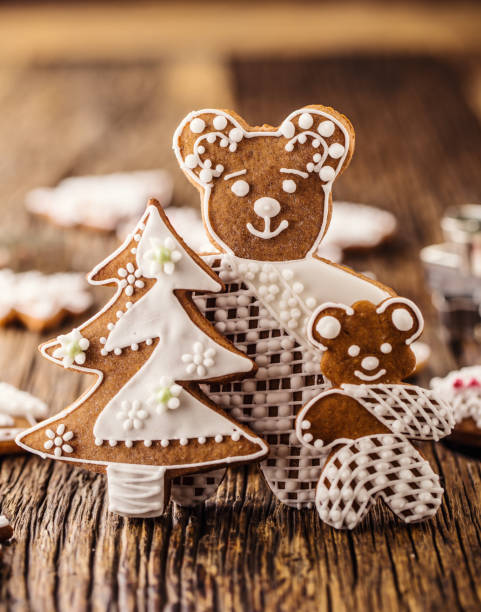 Christmas. Gingerbread family with christmas tree and christmas pastry