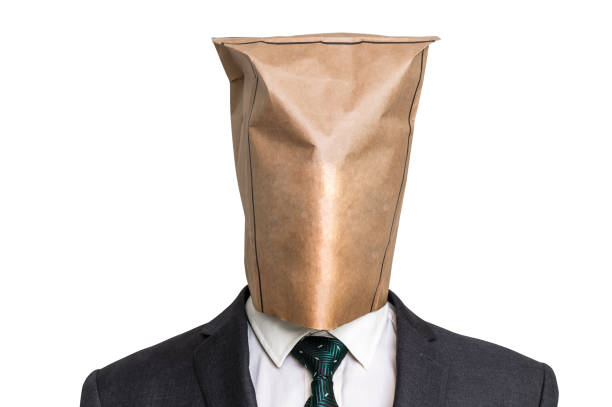 бизнесмен с пустым бумажным пакетом на голове - identity question mark mask business стоковые фото и изображения