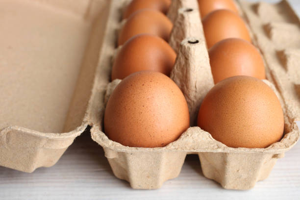 istock Yellow chicken egg in the tray 857294732