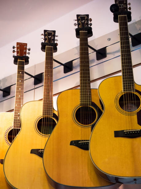 istock Musical instruments on display at a music store 857298218