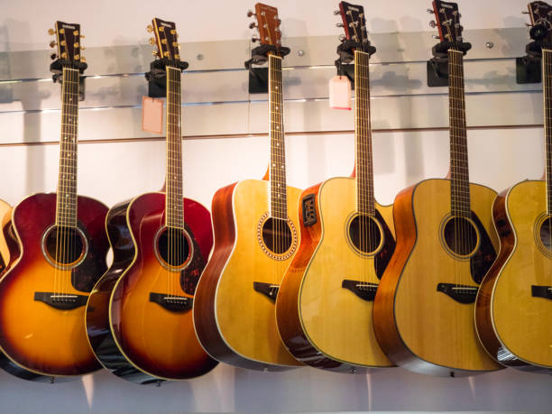 istock Musical instruments on display at a music store 857298844