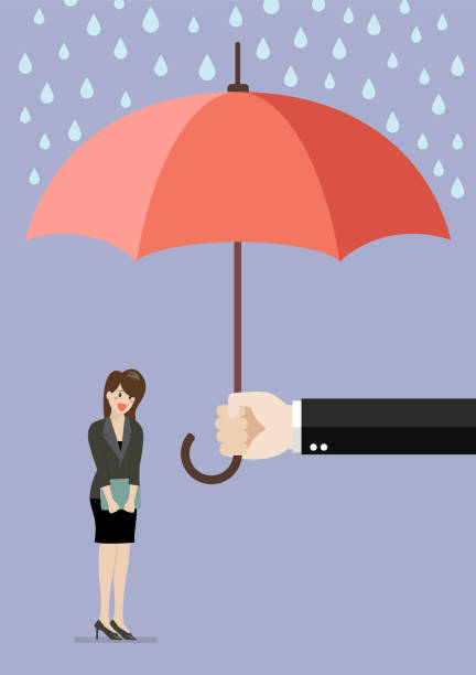 istock Hand holding an umbrella protecting business woman 857307318