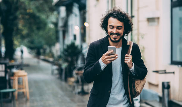 istock Man texting in the city 857307896
