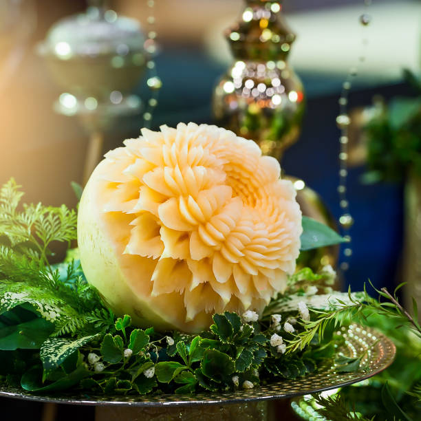 istock Orange Cantaloupe Melon Carving - Traditional Thai Art. 857311826