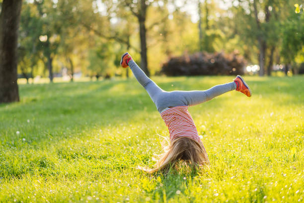 istock Young girl playing in park 857312284