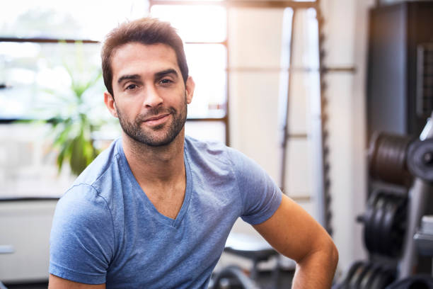 istock Gym dude in t-shirt 857314094