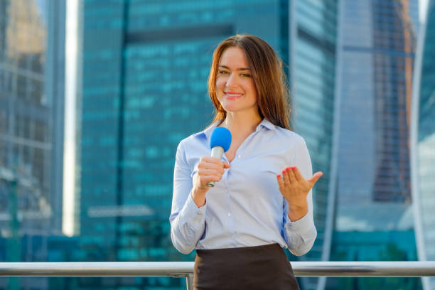 istock Young girl TV reporter is broadcasting 857314562