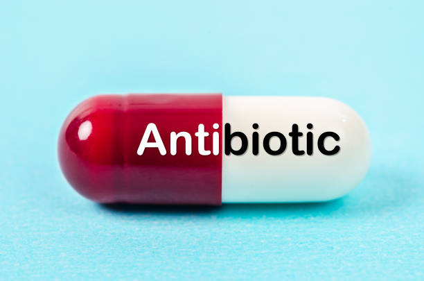 istock Red and white pills capsule with antibiotic 857324134