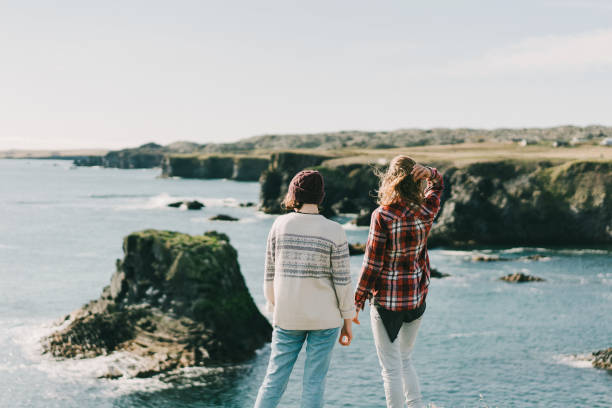 istock Two women  walking on the beach in Iceland 857324234