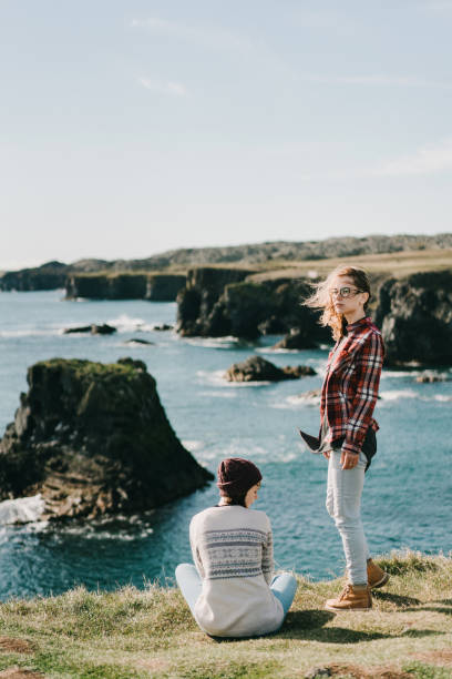 istock Two women  walking on the beach in Iceland 857324246