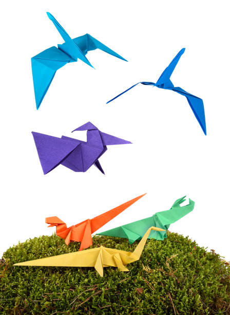 istock Group of colored origami paper dinosaurus 857325318
