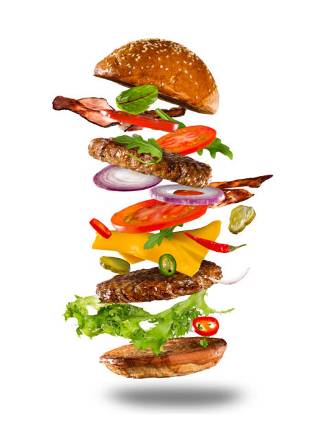 istock Big tasty burger with flying ingredients 857325326