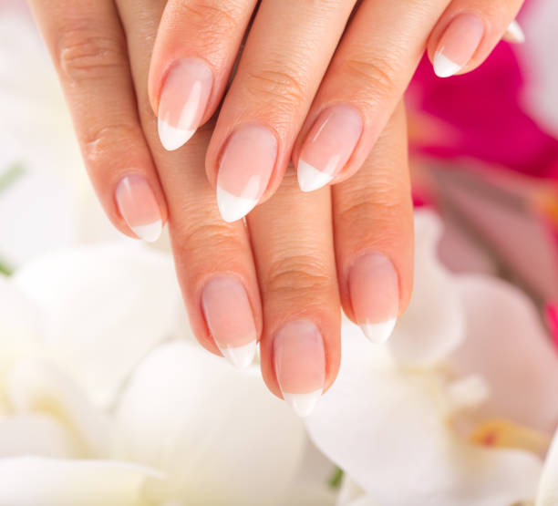 istock Beautiful woman's nails, french manicure 857337622