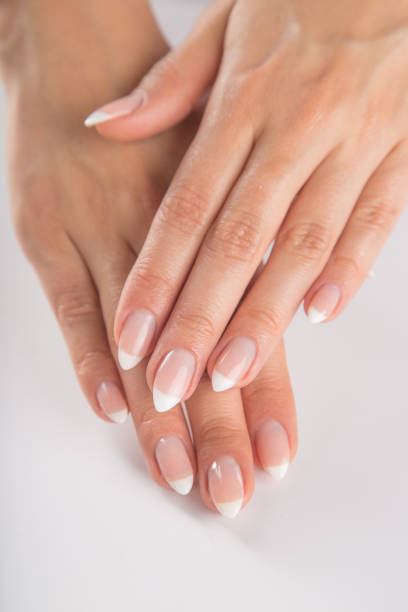 istock Beautiful woman's nails, french manicure 857337970