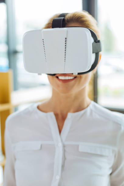 istock Cheerful nice woman wearing 3d glasses 857338092