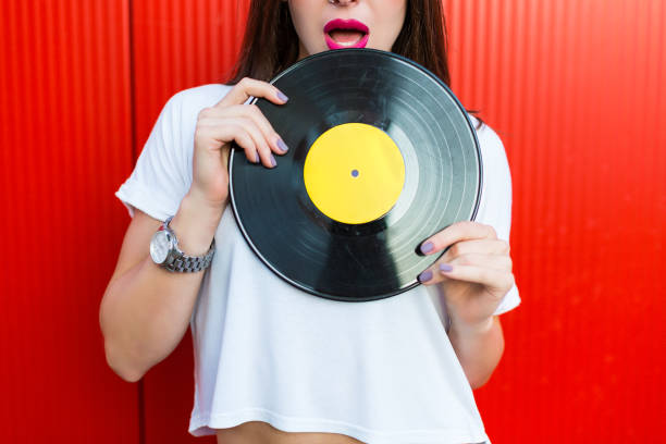 istock Woman holding a vinyl record 857341398