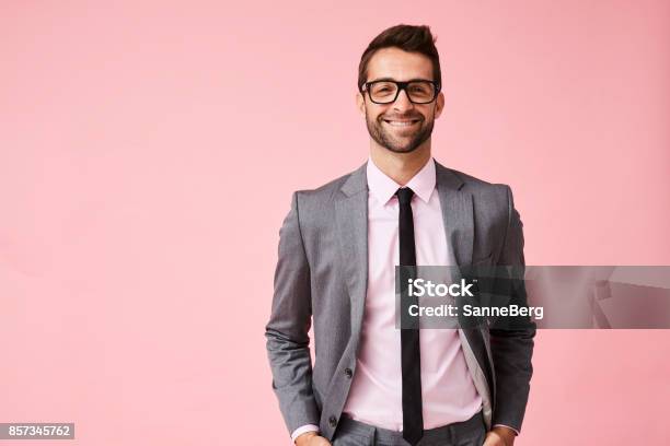 Happy Grey Suit Guy Stock Photo - Download Image Now - Men, Colored Background, Suit