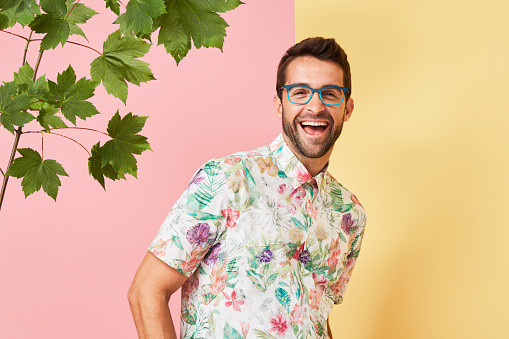 Laughing guy in spectacles and shirt, portrait