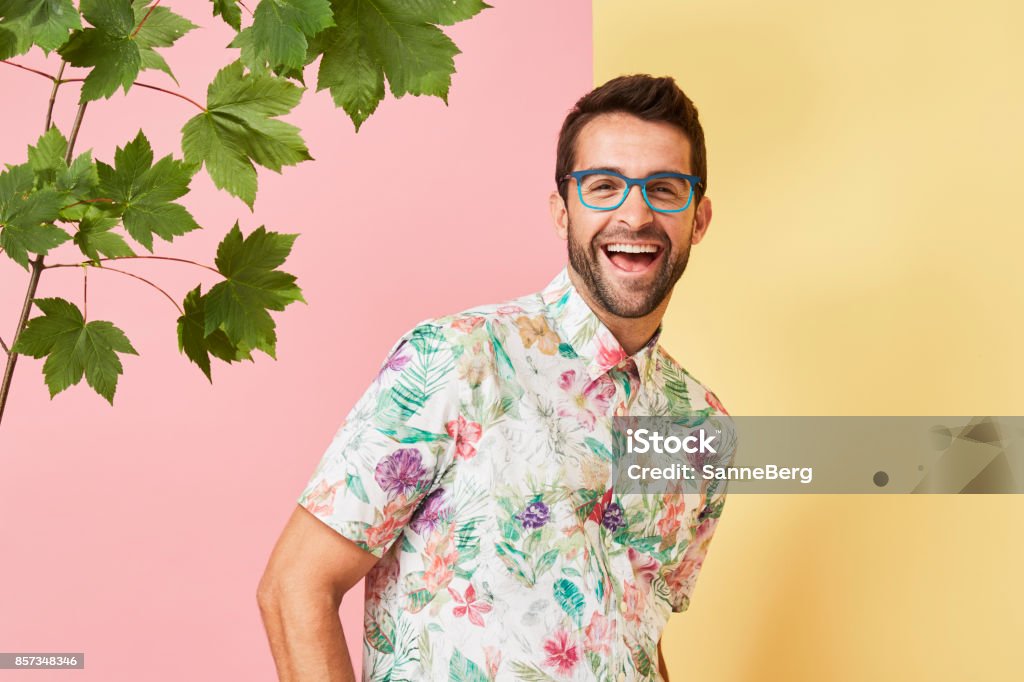 Laughing guy in specs Laughing guy in spectacles and shirt, portrait Fashion Stock Photo