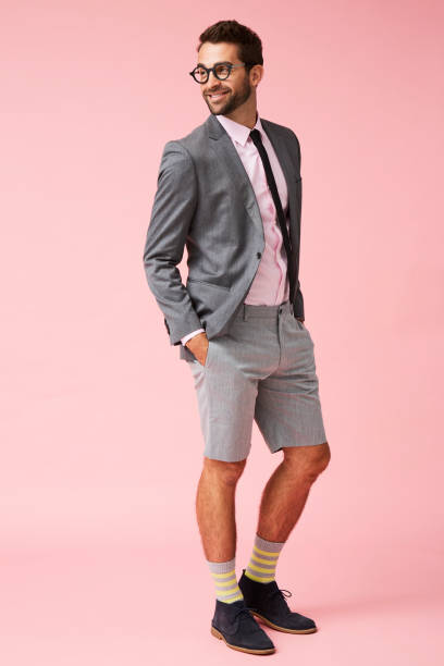 istock Happy guy in suit and shorts 857348422