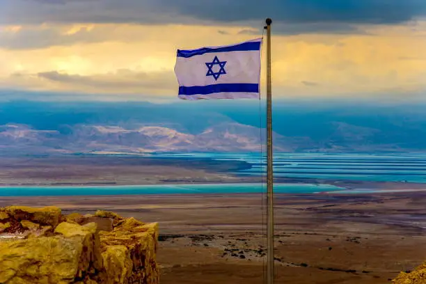 Israeli flag over the Masada Fortress, Dead Sea Israel