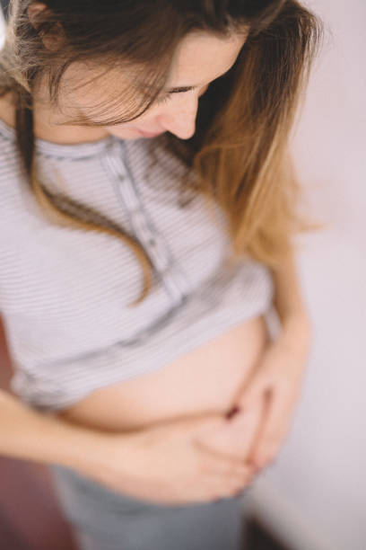 istock Pregnant woman at home 857357686