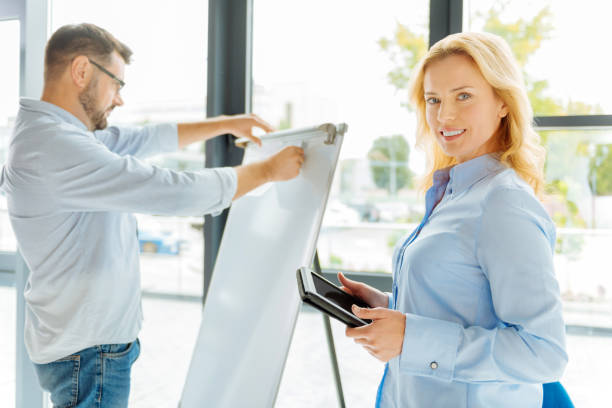 istock Delighted blonde standing in semi position 857358454