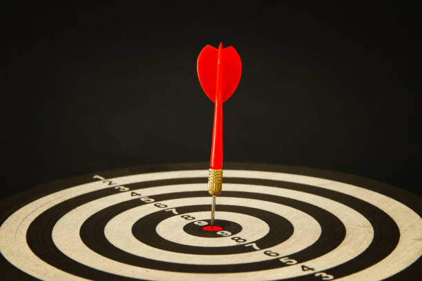 istock Red darts arrows in the target center 857361654