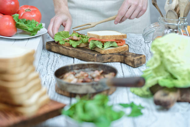 istock Bacon, lettuce and tomato sandwiches cooking 857365460