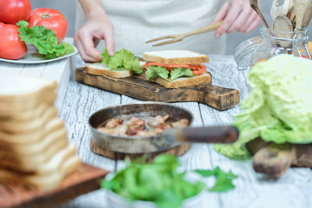 istock Bacon, lettuce and tomato sandwiches cooking 857365602