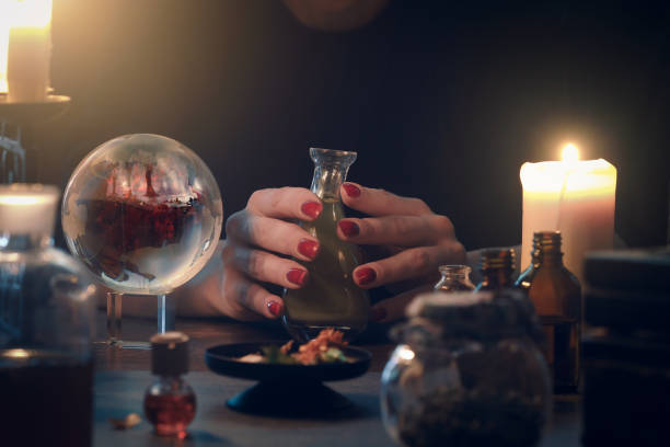 istock Witchcraft. The hands of witches, magic ball 857369364
