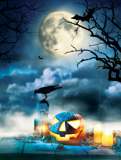 istock Spooky halloween pumpkin on wooden planks 857375608