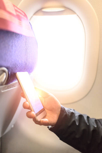 istock People use mobile phone in aircraft 857375662