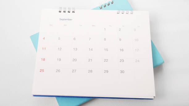 istock Blurred calendar in white tone. 857375734