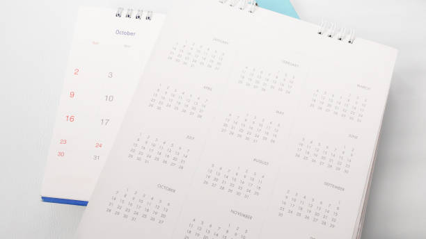 istock Blurred calendar in white tone. 857375804
