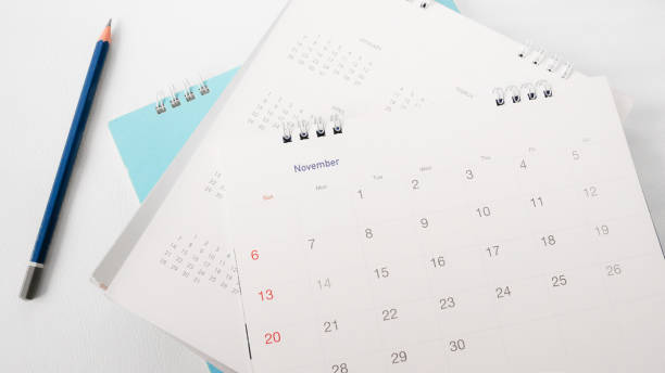 istock Blurred calendar in white tone. 857375814