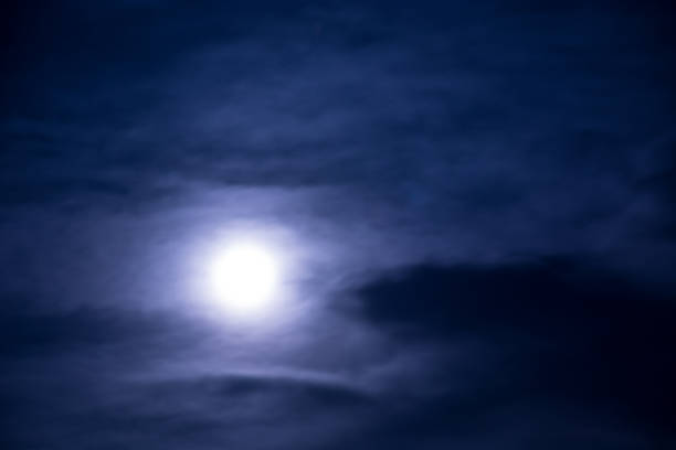 bright Moon in the black sky. mystical light from the Moon in a black sky. full moon