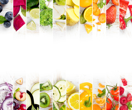 Top view of rainbow colorful mix stripes with fruits and vegetables; healthy eating concept; white space for text