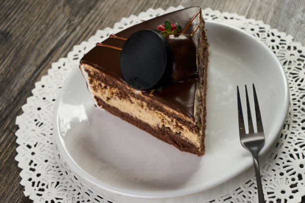 istock Slice of chocolate cake with chocolate cream 857384398