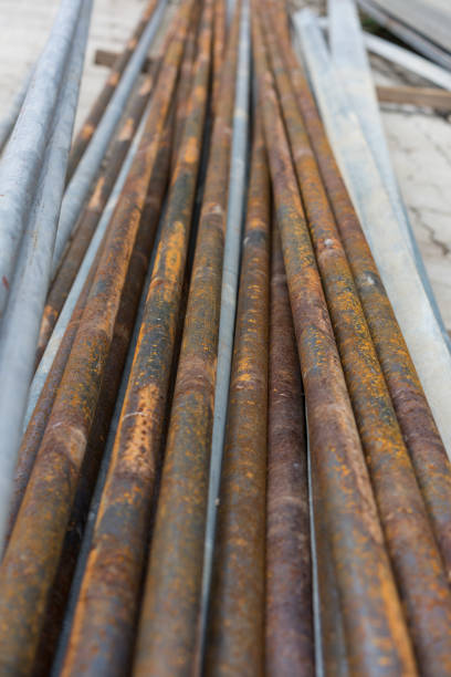 istock rusty metal pipes for construction and industrial use laying on heap 857396726